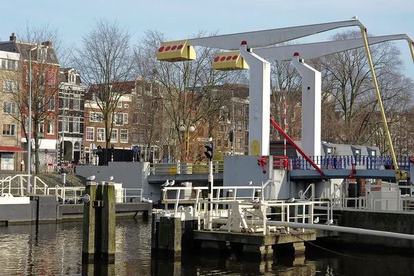 2014.01 - Amsterdam, photo: Modern balance-bridge architecture and old water-locks in the canal Nieuwe Vaart; a geotagged free urban picture, in public domain / Commons CCO; city photography by Fons Heijnsbroek, The Netherlands
