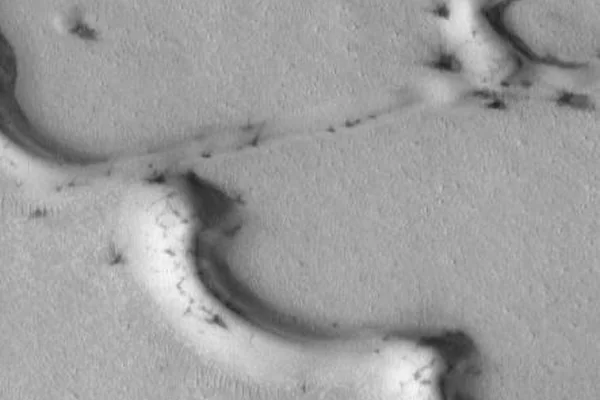 Evidence for Recent Wind Action on Martian Sand Dunes