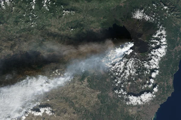 Volcanic Plumes Tower over Mount Etna