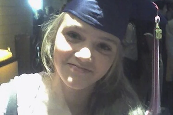 Cassidy in a graduation cap