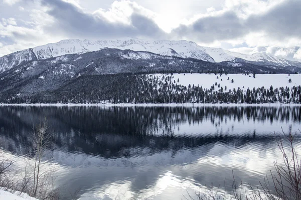 Wallowa Lake reflection in winter, Oregon .