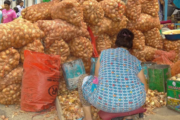 Woman Vendor of Onions - Food Market - Bazaar - Fergana - Uzbekistan