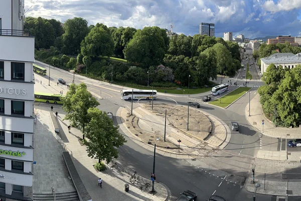 OSLO Norway 2026-06-10 Rooftop cityscape view from Odd Fellow (Stortingsg 28) Konserth. Munkedamsv. Torstedgården Medicus Slottsparken Abelhaugen Henrik Ibsens g roundabout Frederiks g Nationalth. J Dybwad University bus Distorted pa
