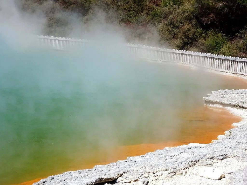 Rotorua. The sulphur coloured edge of Champagne Lake in the geothermal volcanic park of Wai O Tapu.