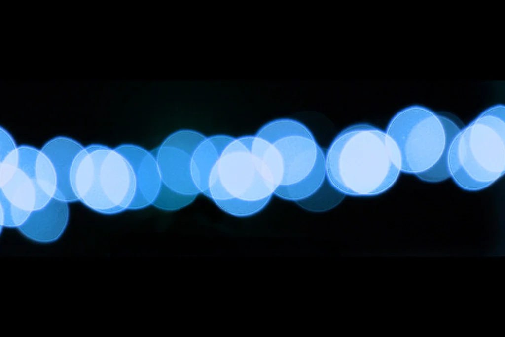 Blue Bokeh on Black Background