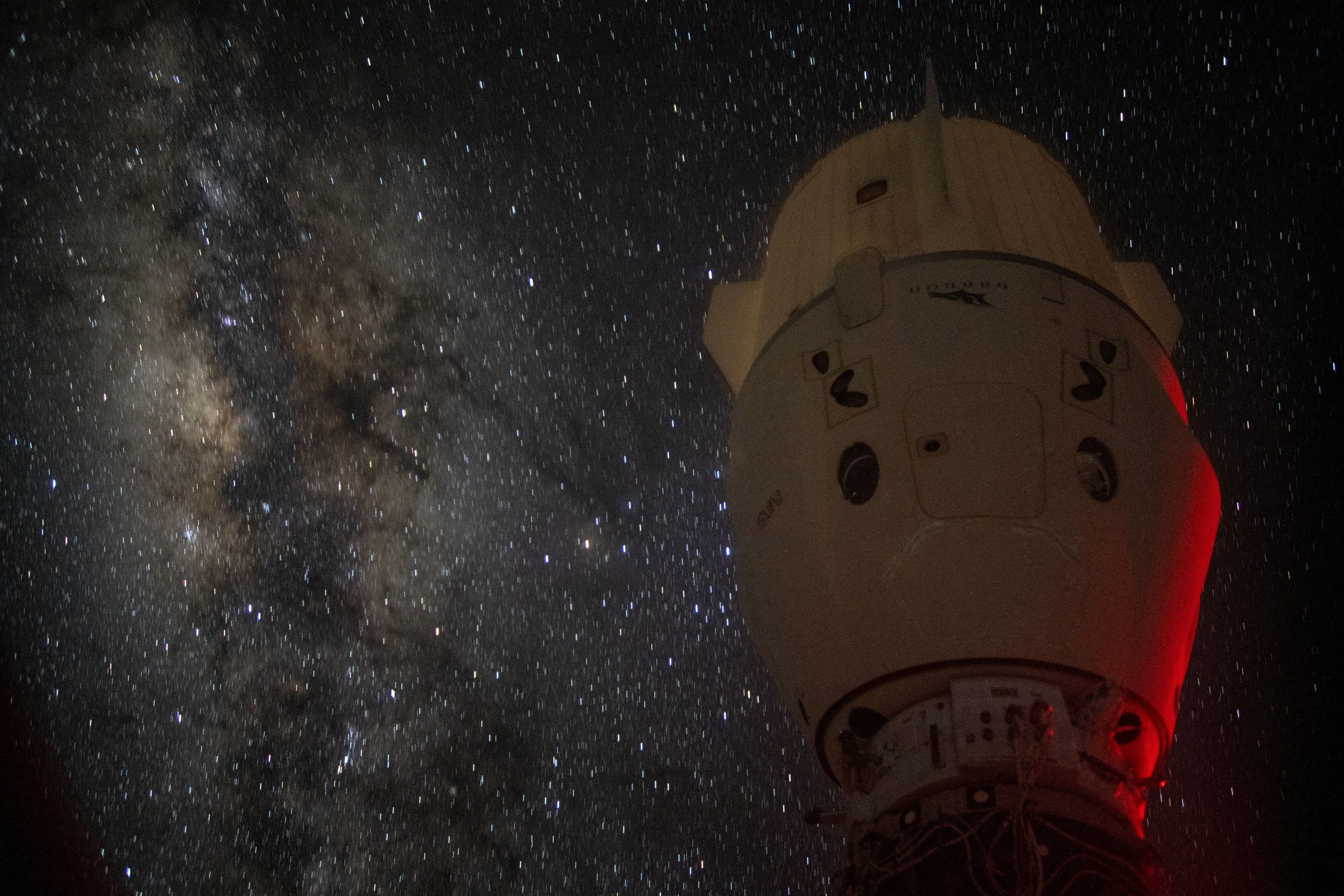The Milky Way appears behind the SpaceX Dragon Endeavour